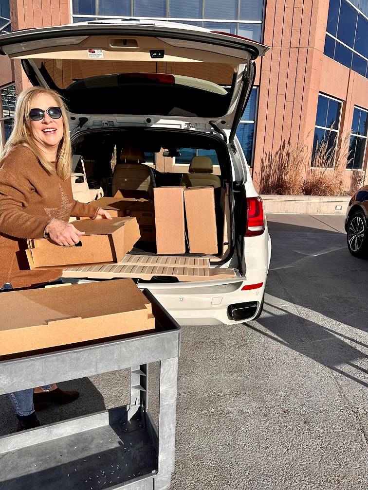 Holiday cookie project Cindy unloading the car Holiday cookie project Cindy unloading the car