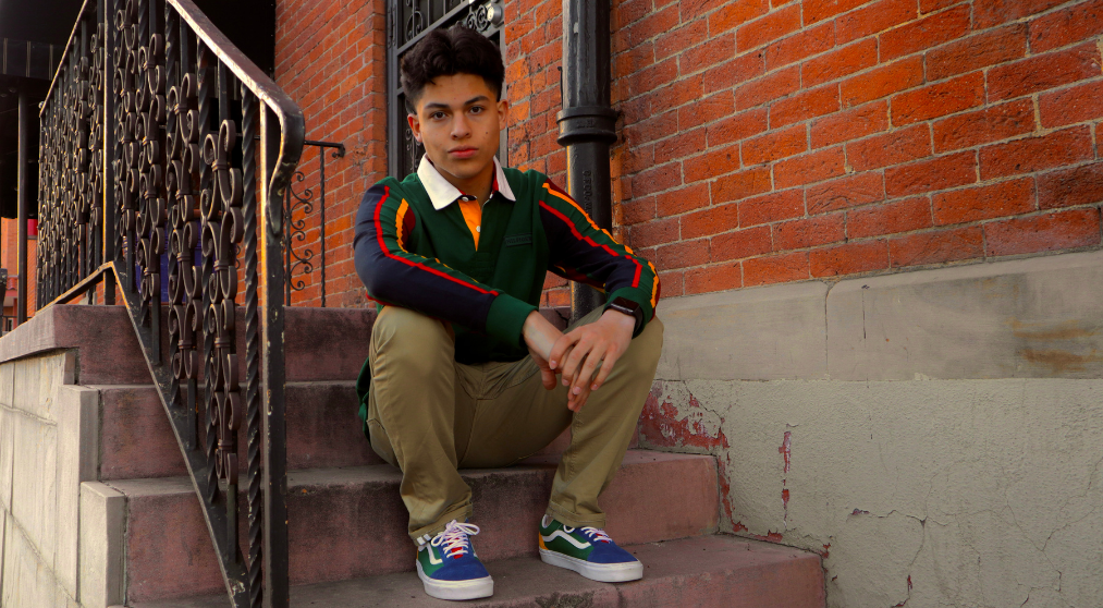 Man sitting on stairs.