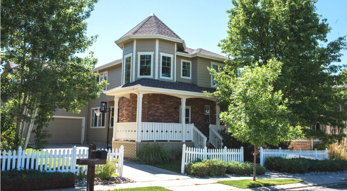 classic home in fort collins with a wrap around front porch