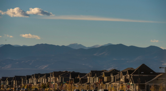 Houses with mountains in the background
