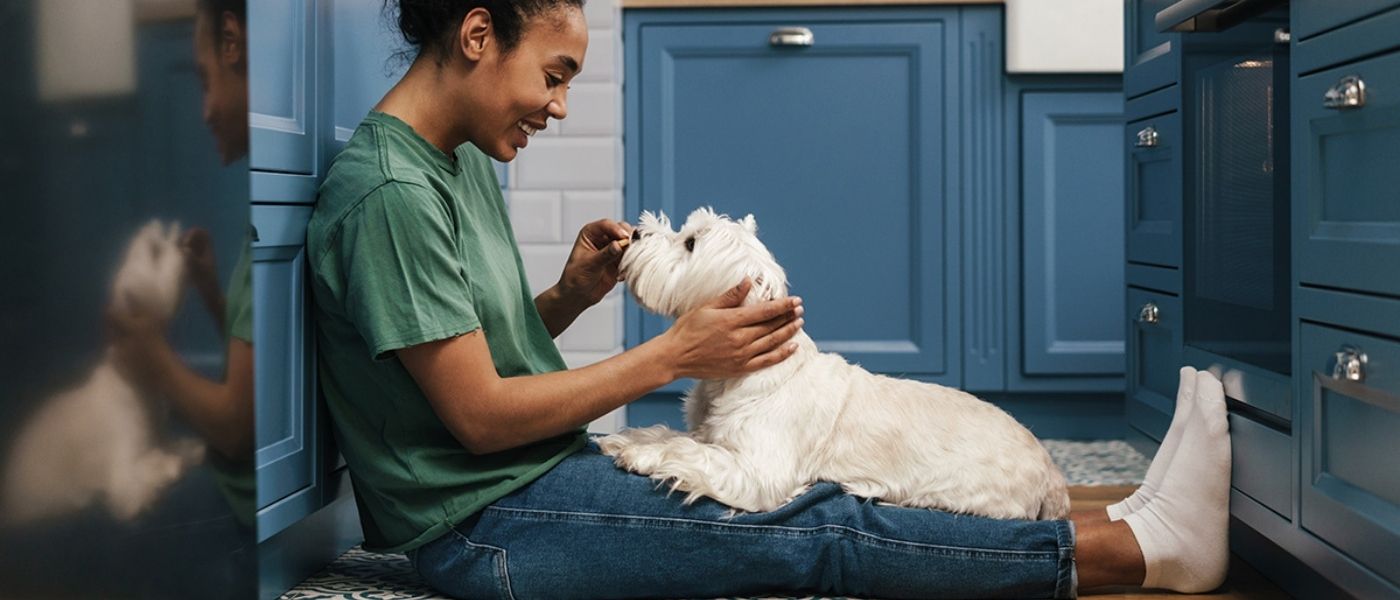 woman in kitchen with dog blog