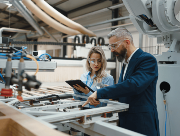 People using manufacturing equipment.png