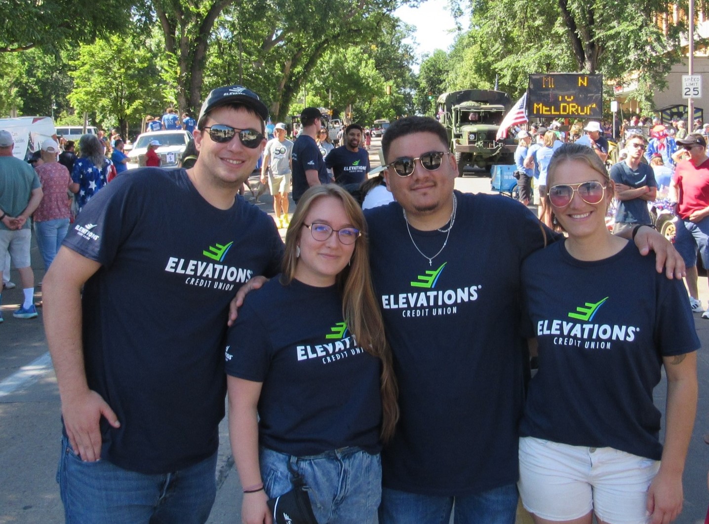 4thJuly-veteransERG-1-1.jpg Elevations employees and Veterans ERG members in a staged photo at a Fourth of July parade