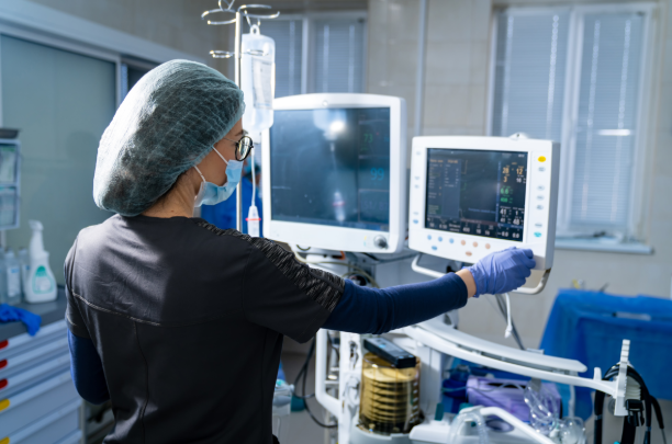 Woman using medical equipment